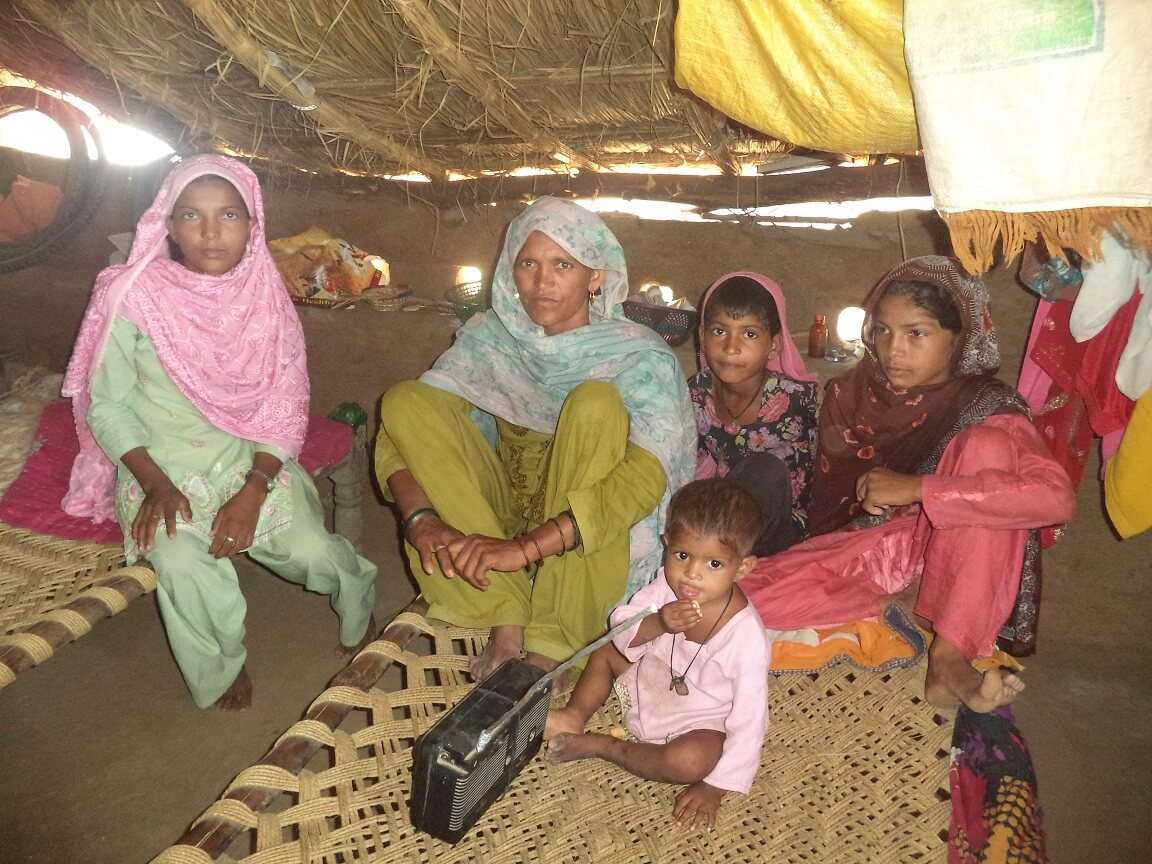 The women and children of the same family in rural Mewat listening to their own radio channel ALfaz-e-Mewat at FM 107.8 village Dungeja (1)